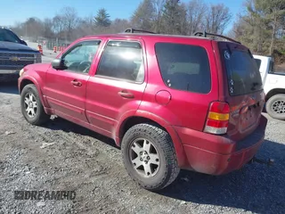 2005 Ford Escape Limited with VIN 1FMYU94135KC22117, listed as a IAAI auction lot 41441590 with 238,811 mi miles. Bid and sale history available at carsss.com. Image 3.