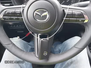 2024 Mazda 3 S Preferred z VIN 3MZBPACM7RM431371, wystawiony jako IAAI lot #40676189 z przebiegiem 276 mil mil oraz . Historia ofert i sprzedaży dostępna na DreamBid. Obrazek 11.