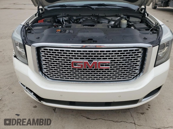 2015 GMC Yukon Denali with VIN 1GKS1CKJ5FR293612, listed as a Copart auction lot 47625975 with 98,533 mi miles and Salvage Title. Bid and sale history available at carsss.com. Image 12.
