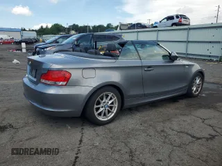 2011 BMW 1 Series 128i with VIN WBAUN1C52BVH82744, listed as a Copart auction lot 63441125 with 129,245 mi miles and Salvage title. Bid and sale history available at DreamBid. Image 3.