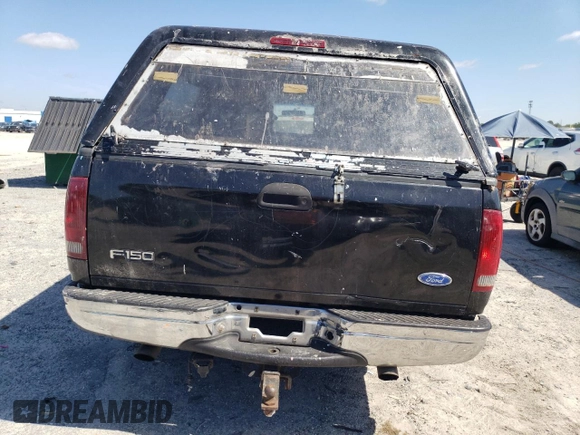 1997 Ford F-150 XL z VIN 1FTEX17L8VNB84878, wystawiony jako Copart lot #52695045 z przebiegiem 446 498 mil mil oraz Szkoda całkowita • Salvage title. Historia ofert i sprzedaży dostępna na DreamBid. Obrazek 6.