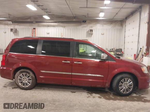 2015 Chrysler Town & Country Touring L with VIN 2C4RC1CG8FR525304, listed as a IAAI auction lot 41829438 with 125,587 mi miles and . Bid and sale history available at DreamBid. Image 13.
