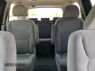 2007 Honda Odyssey LX with VIN 5FNRL38287B054504, listed as a Copart auction lot 59141665 with 128,617 mi miles and Salvage title. Bid and sale history available at DreamBid. Image 10.