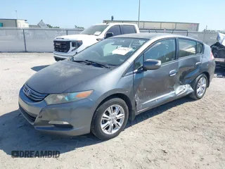 2010 Honda Insight EX z VIN JHMZE2H72AS036072, wystawiony jako IAAI lot #42139823 z przebiegiem 257 511 mil mil oraz . Historia ofert i sprzedaży dostępna na DreamBid. Obrazek 2.