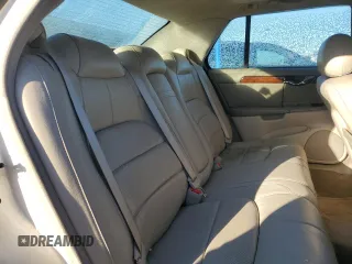 2003 Cadillac DeVille DTS z VIN 1G6KF57963U257494, wystawiony jako Copart lot #84532944 z przebiegiem 104 766 mil mil oraz Szkoda całkowita • Salvage title. Historia ofert i sprzedaży dostępna na DreamBid. Obrazek 10.