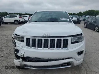 2016 Jeep Grand Cherokee Overland z VIN 1C4RJFCG1GC377512, wystawiony jako Copart lot #62996785 z przebiegiem 160 718 mil mil oraz Szkoda całkowita • Salvage title. Historia ofert i sprzedaży dostępna na DreamBid. Obrazek 5.