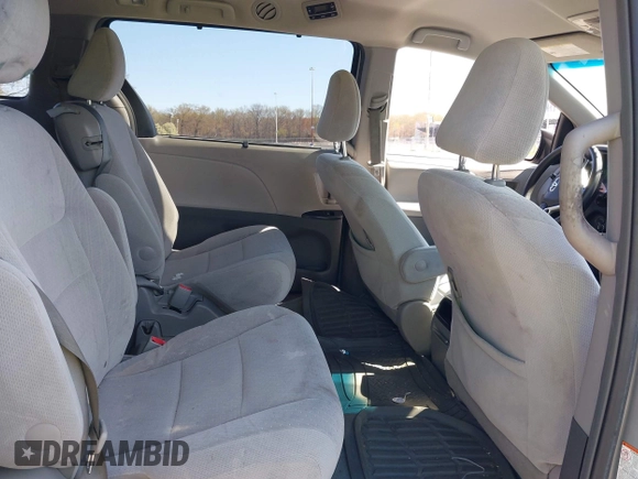 2015 Toyota Sienna LE AAS with VIN 5TDKK3DC0FS663826, listed as a IAAI auction lot 42050229 with 126,971 mi miles and . Bid and sale history available at DreamBid. Image 8.