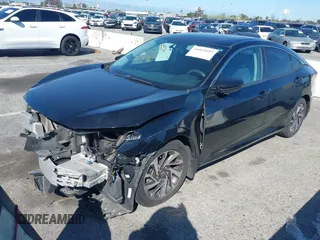 2016 Honda Civic EX with VIN 19XFC2F71GE023712, listed as a IAAI auction lot 41824595 with 87,127 mi miles and . Bid and sale history available at DreamBid. Image 18.