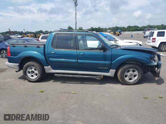 2001 Ford Explorer Sport Trac z VIN 1FMZU77E91UC28669, wystawiony jako Copart lot #76438624 z przebiegiem 128 484 mil mil oraz Nie do naprawy • Non repairable. Historia ofert i sprzedaży dostępna na DreamBid. Obrazek 4.