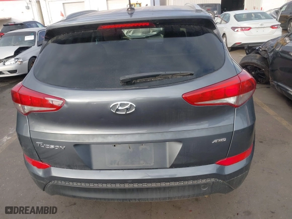 2016 Hyundai Tucson SE with VIN KM8J3CA47GU128085, listed as a IAAI auction lot 41109798 with 156,861 mi miles. Bid and sale history available at carsss.com. Image 16.