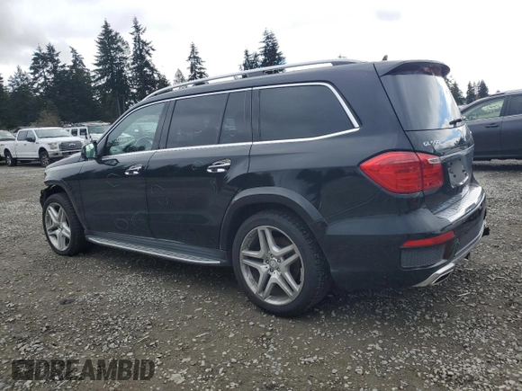 2015 Mercedes-Benz GL-Class GL 550 with VIN 4JGDF7DE5FA498354, listed as a Copart auction lot 47321215 with 100,702 mi miles and Salvage Title. Bid and sale history available at carsss.com. Image 2.