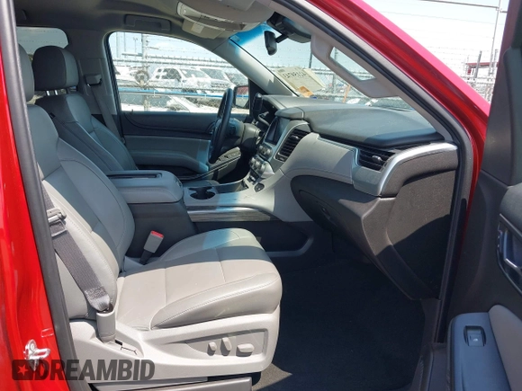 2015 Chevrolet Tahoe LT with VIN 1GNSKBKC6FR628355, listed as a IAAI auction lot 42159743 with 95,730 mi miles and . Bid and sale history available at DreamBid. Image 5.