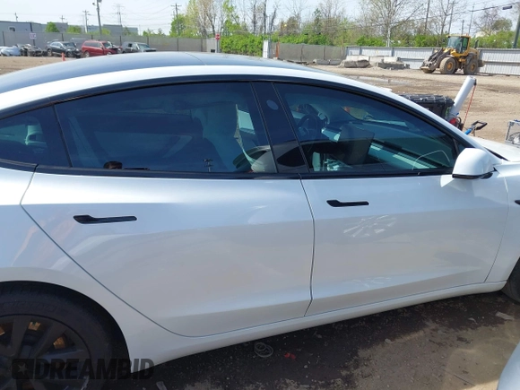 2020 Tesla Model 3 Standard Range Plus with VIN 5YJ3E1EA3LF785951, listed as a IAAI auction lot 41919339 with 63,025 mi miles and . Bid and sale history available at carsss.com. Image 12.