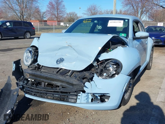 2014 Volkswagen Beetle 2.5L w/Sun with VIN 3VWJP7AT6EM601318, listed as a IAAI auction lot 41902598 with 169,220 mi miles and . Bid and sale history available at DreamBid. Image 6.