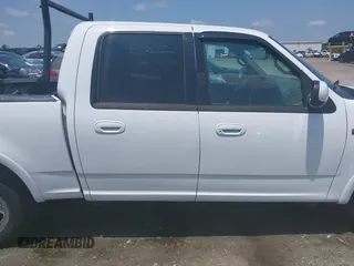 2001 Ford F-150 XLT with VIN 1FTRW07L91KB77612, listed as a IAAI auction lot 42432387 with 106,574 mi miles and . Bid and sale history available at DreamBid. Image 13.