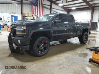 2017 Chevrolet Silverado 1500 LT with VIN 1GCVKREC0HZ402566, listed as a Copart auction lot 49876015 with 119,217 mi miles and Salvage Title. Bid and sale history available at carsss.com. Image 1.