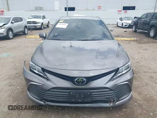 2023 Toyota Camry LE z VIN 4T1C11AK8PU132325, wystawiony jako IAAI lot #42093856 z przebiegiem 29 115 mil mil oraz . Historia ofert i sprzedaży dostępna na DreamBid. Obrazek 13.