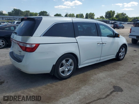 2013 Honda Odyssey Touring with VIN 5FNRL5H99DB052538, listed as a Copart auction lot 66310875 with 192,052 mi miles and Clean title. Bid and sale history available at DreamBid. Image 3.
