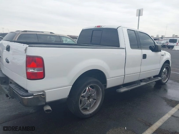 2004 Ford F-150 XL with VIN 1FTPX12574NB21111, listed as a IAAI auction lot 41439224 with 212,887 mi miles. Bid and sale history available at carsss.com. Image 14.