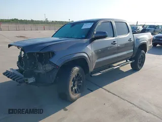 2021 Toyota Tacoma SR with VIN 3TYAX5GN5MT032481, listed as a IAAI auction lot 41979320 with 51,843 mi miles and . Bid and sale history available at DreamBid. Image 2.
