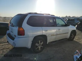 2005 GMC Envoy SLE с VIN 1GKDS13S852261326, выставлен на аукционе Copart как лот 42650025 с пробегом 210 485 миль миль и Списание • Salvage title. История ставок и продаж доступна на DreamBid. Изображение 3.