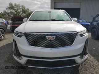 2021 Cadillac XT6 Premium Luxury z VIN 1GYKPCRSXMZ230618, wystawiony jako Copart lot #81022824 z przebiegiem Nie podano mil oraz Szkoda całkowita • Salvage title. Historia ofert i sprzedaży dostępna na DreamBid. Obrazek 5.