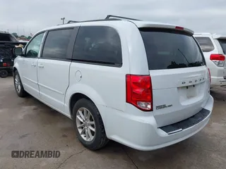 2015 Dodge Grand Caravan SXT with VIN 2C4RDGCG2FR548433, listed as a IAAI auction lot 42121256 with 161,459 mi miles and . Bid and sale history available at DreamBid. Image 3.