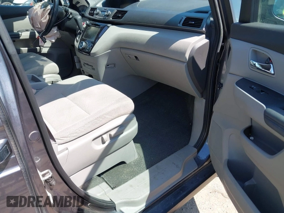 2016 Honda Odyssey SE with VIN 5FNRL5H33GB125693, listed as a IAAI auction lot 41994036 with 163,617 mi miles and . Bid and sale history available at DreamBid. Image 5.