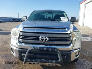 2014 Toyota Tundra SR with VIN 5TFRM5F13EX078411, listed as a IAAI auction lot 42702477 with 123,336 mi miles and . Bid and sale history available at DreamBid. Image 12.