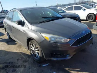 2016 Ford Focus SE z VIN 1FADP3F27GL249885, wystawiony jako IAAI lot #41499199 z przebiegiem 165 416 mil mil oraz . Historia ofert i sprzedaży dostępna na DreamBid. Obrazek 1.