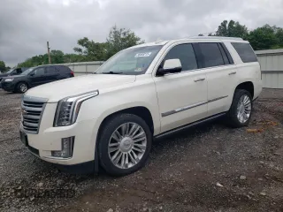 2015 Cadillac Escalade Platinum z VIN 1GYS4PKJ9FR599510, wystawiony jako Copart lot #56688215 z przebiegiem 292 890 mil mil oraz Szkoda całkowita • Salvage title. Historia ofert i sprzedaży dostępna na DreamBid. Obrazek 1.