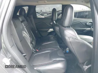 2018 Jeep Cherokee Trailhawk with VIN 1C4PJMBX0JD534722, listed as a IAAI auction lot 41557426 with 109,429 mi miles and . Bid and sale history available at DreamBid. Image 8.