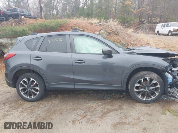 2016 Mazda CX-5 Grand Touring with VIN JM3KE4DY1G0743897, listed as a IAAI auction lot 41935796 with 167,150 mi miles and . Bid and sale history available at carsss.com. Image 14.