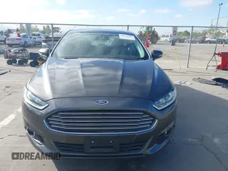2016 Ford Fusion SE Hybrid z VIN 3FA6P0LU6GR145421, wystawiony jako IAAI lot #42650918 z przebiegiem 105 990 mil mil oraz . Historia ofert i sprzedaży dostępna na DreamBid. Obrazek 13.