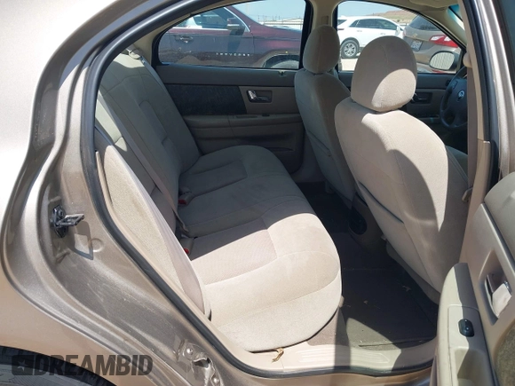 2003 Mercury Sable GS z VIN 1MEFM50U23A601955, wystawiony jako IAAI lot #42197171 z przebiegiem 94 977 mil mil oraz . Historia ofert i sprzedaży dostępna na DreamBid. Obrazek 8.
