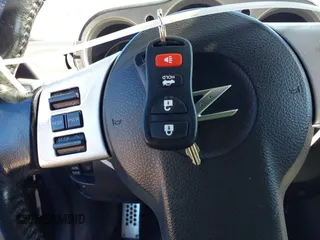 2006 Nissan 350Z Touring with VIN JN1AZ36A46M480186, listed as a IAAI auction lot 41663579 with 114,176 mi miles. Bid and sale history available at carsss.com. Image 11.