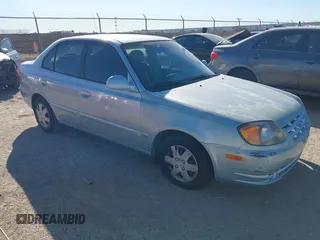 2003 Hyundai Accent GL with VIN KMHCG45C73U455357, listed as a IAAI auction lot 41395159 with 86,488 mi miles. Bid and sale history available at carsss.com. Image 1.