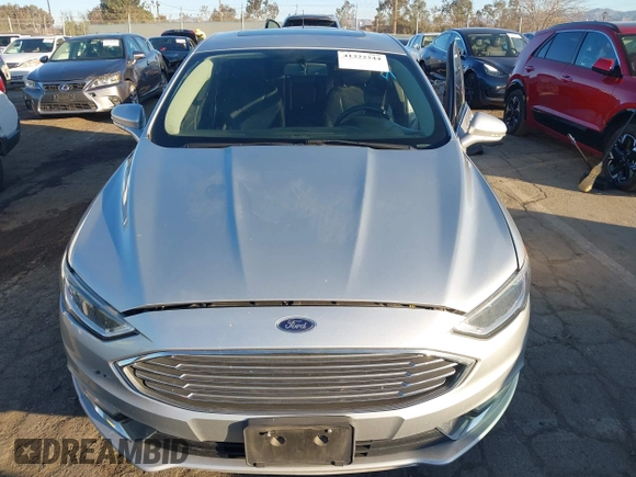 2017 Ford Fusion Hybrid Titanium with VIN 3FA6P0RU8HR190482, listed as a IAAI auction lot 41322244 with 137,539 mi miles and . Bid and sale history available at DreamBid. Image 12.