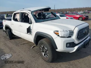 2019 Toyota Tacoma SR z VIN 3TMCZ5AN9KM211188, wystawiony jako IAAI lot #41757348 z przebiegiem 78 700 mil mil oraz . Historia ofert i sprzedaży dostępna na DreamBid. Obrazek 1.