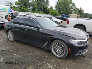 2018 BMW 5 Series 530e xDrive with VIN WBAJB1C55JB374313, listed as a Copart auction lot 62969295 with 70,596 mi miles and Clean title. Bid and sale history available at DreamBid. Image 4.
