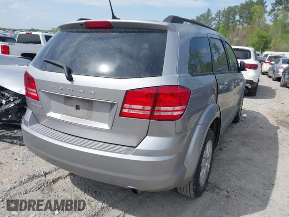 2017 Dodge Journey SE z VIN 3C4PDCAB0HT694918, wystawiony jako IAAI lot #42010594 z przebiegiem 135 432 mil mil oraz . Historia ofert i sprzedaży dostępna na DreamBid. Obrazek 4.