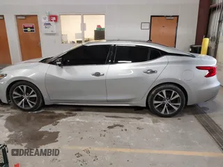 2016 Nissan Maxima SL with VIN 1N4AA6AP6GC384851, listed as a IAAI auction lot 41663659 with 127,247 mi miles and . Bid and sale history available at DreamBid. Image 14.