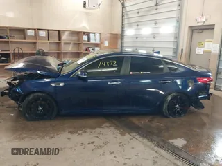 2016 Kia Optima LX with VIN 5XXGT4L33GG026572, listed as a IAAI auction lot 41514872 with 135,423 mi miles. Bid and sale history available at carsss.com. Image 14.
