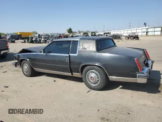 1985 Cadillac Eldorado z VIN 1G6EL5780FE622179, wystawiony jako Copart lot #54109205 z przebiegiem 73 403 mil mil oraz Szkoda całkowita • Salvage title. Historia ofert i sprzedaży dostępna na DreamBid. Obrazek 2.