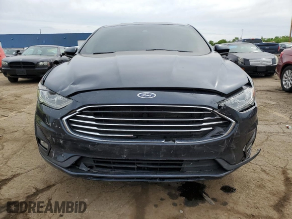 2020 Ford Fusion SE с VIN 3FA6P0HD7LR219884, выставлен на аукционе Copart как лот 57802645 с пробегом 43 520 миль миль и Списание • Salvage title. История ставок и продаж доступна на DreamBid. Изображение 5.