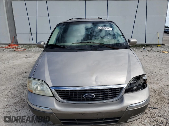 2003 Ford Windstar LTD z VIN 2FMDA58483BA47178, wystawiony jako Copart lot #75730344 z przebiegiem 174 036 mil mil oraz Szkoda całkowita • Salvage title. Historia ofert i sprzedaży dostępna na DreamBid. Obrazek 5.