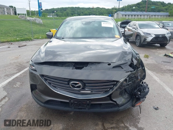 2017 Mazda CX-9 Touring z VIN JM3TCACY7H0129335, wystawiony jako IAAI lot #42289926 z przebiegiem 60 425 mil mil oraz . Historia ofert i sprzedaży dostępna na DreamBid. Obrazek 13.