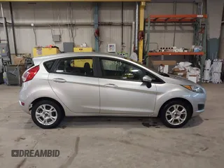 2016 Ford Fiesta SE with VIN 3FADP4EJ9GM197205, listed as a IAAI auction lot 41815313 with 115,689 mi miles. Bid and sale history available at carsss.com. Image 13.