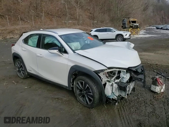 2021 Lexus UX 250h z VIN JTHX9JBH1M2037919, wystawiony jako Copart lot #46970385 z przebiegiem Nie podano mil oraz Szkoda całkowita • Salvage title. Historia ofert i sprzedaży dostępna na DreamBid. Obrazek 14.