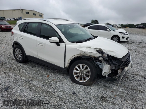 2016 Mazda CX-5 Sport with VIN JM3KE2BY0G0843786, listed as a Copart auction lot 54451275 with 111,363 mi miles and Salvage title. Bid and sale history available at DreamBid. Image 4.